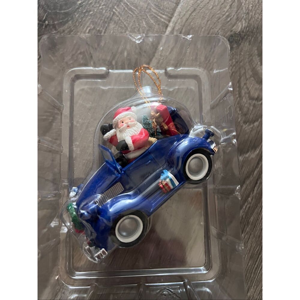 Kirkland Signature Christmas ornament featuring Santa in a blue car